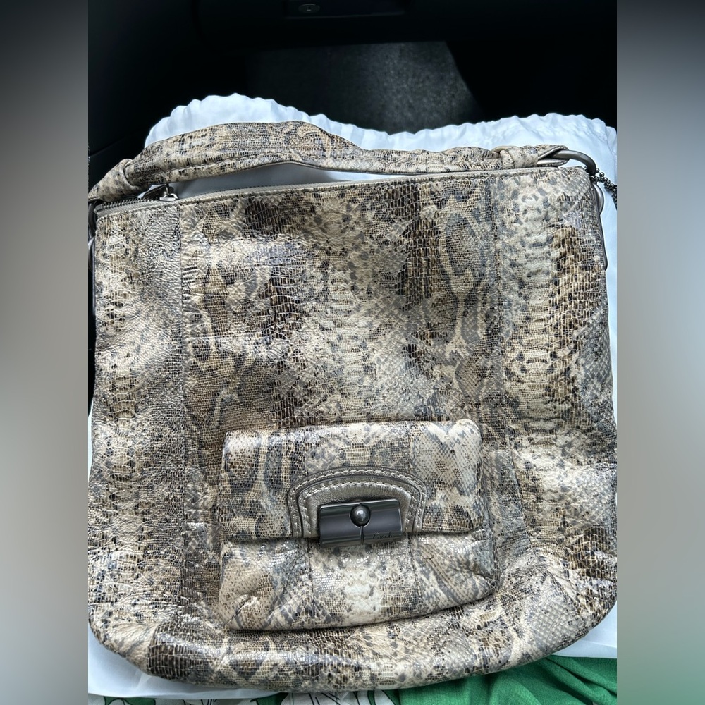 Coach Authentic snakeskin purse
Cream, taupe, black snakeskin